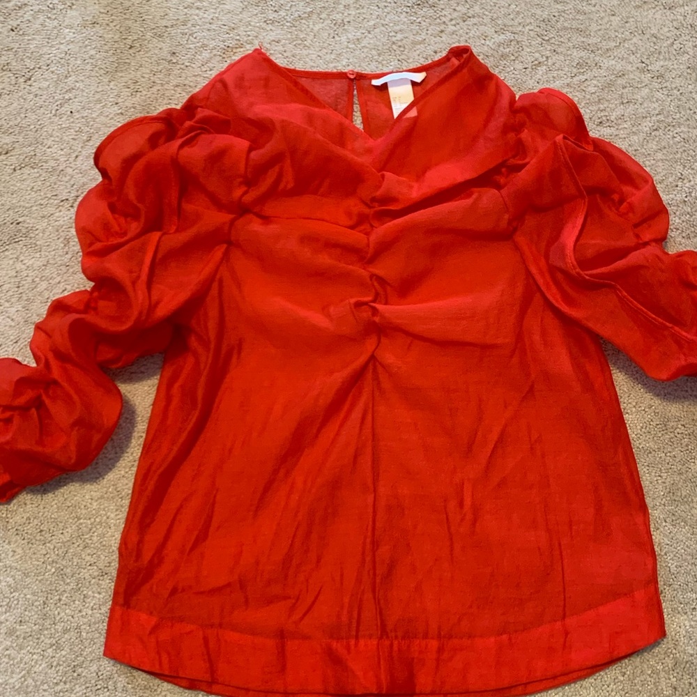 Adorable red lightweight sheer top. Woman size 6 like new Ruched sleeves.